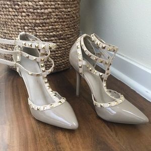Nude patent leather heels with gold studs